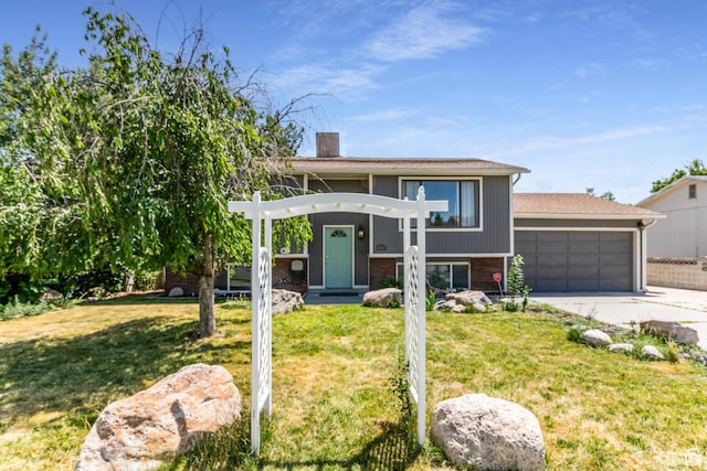 4287 W Stratus S, Kearns, UT 84118 - bi-level home featuring brick siding, concrete driveway, a front lawn, and a chimney
