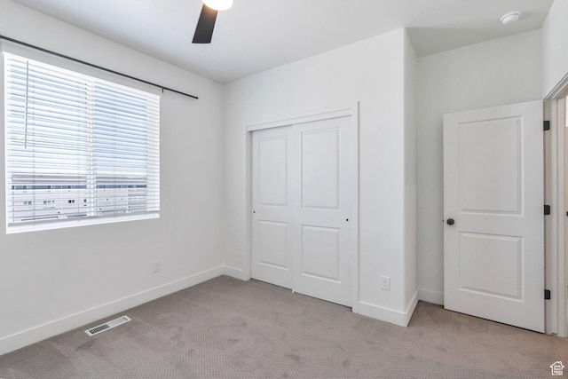 514 S 900 W Unit 167, American Fork, UT 84003 - unfurnished bedroom with light colored carpet, a closet, and ceiling fan