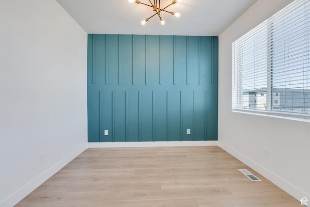 514 S 900 W Unit 167, American Fork, UT 84003 - spare room with a chandelier and wood finished floors
