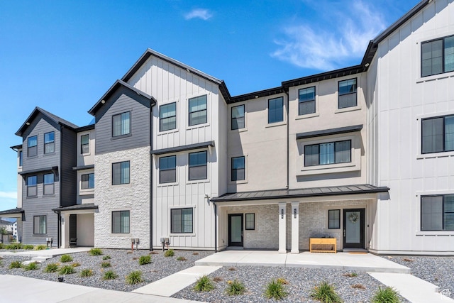 514 S 900 W Unit 167, American Fork, UT 84003 - townhome / multi-family property featuring board and batten siding, a standing seam roof, and a metal roof