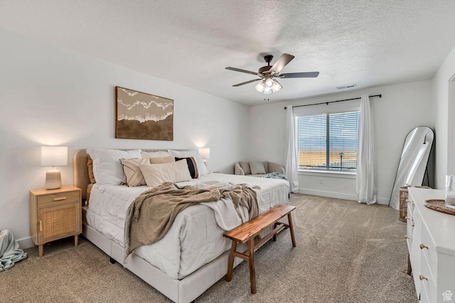 1162 N 550 W Unit 110, Tooele, UT 84074 - bedroom featuring light carpet, a textured ceiling, and a ceiling fan