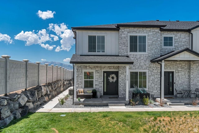 1162 N 550 W Unit 110, Tooele, UT 84074 - view of front of home with stone siding and board and batten siding