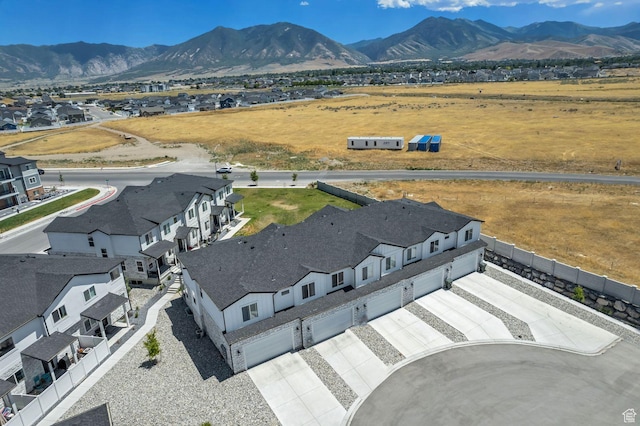 1162 N 550 W Unit 110, Tooele, UT 84074 - aerial view of residential area featuring a mountain backdrop
