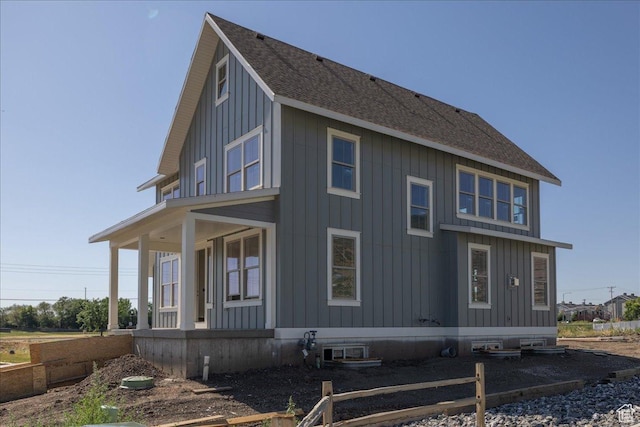 592 W Kennard Ln Unit 212, Farmington, UT 84025 - rear view of house with a porch, roof with shingles, and board and batten siding