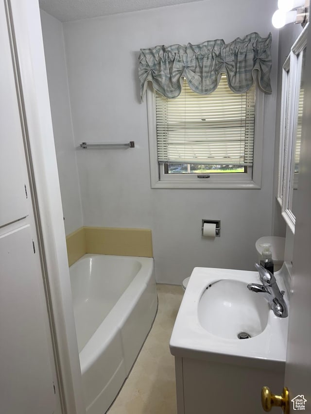 5166 S 2150 W, Roy, UT 84067 - full bathroom with a tub and vanity