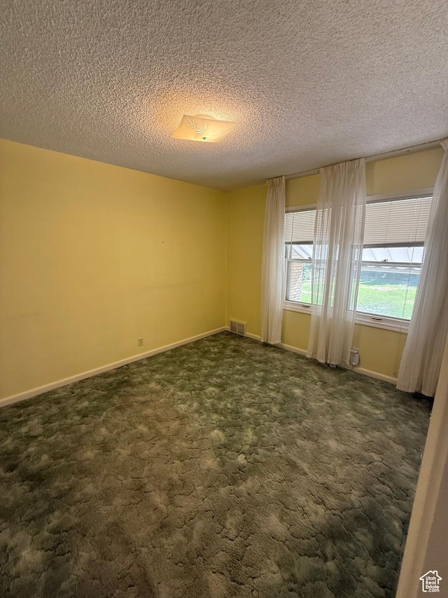 5166 S 2150 W, Roy, UT 84067 - unfurnished room with dark carpet and a textured ceiling