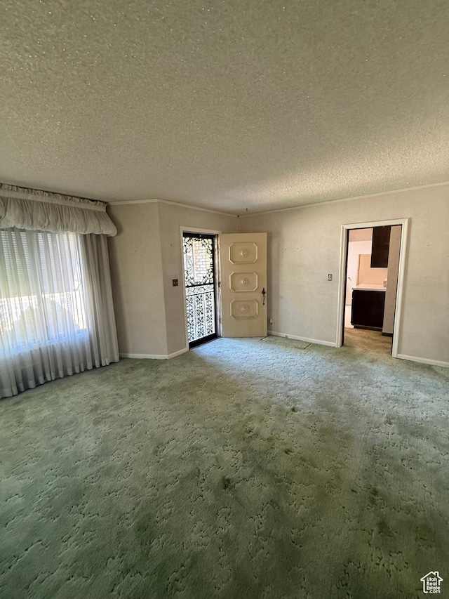 5166 S 2150 W, Roy, UT 84067 - unfurnished living room featuring a textured ceiling and carpet flooring