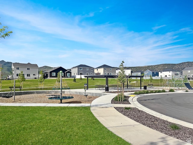 7194 N Clear Meadow Way, Eagle Mountain, UT 84005 - view of home's community with a residential view and a yard