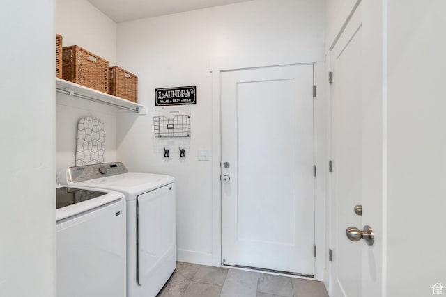 7194 N Clear Meadow Way, Eagle Mountain, UT 84005 - laundry area featuring washer and clothes dryer and light tile patterned floors