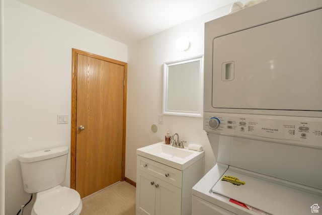 975 S 400 E, Moab, UT 84532 - bathroom featuring stacked washer / drying machine and vanity