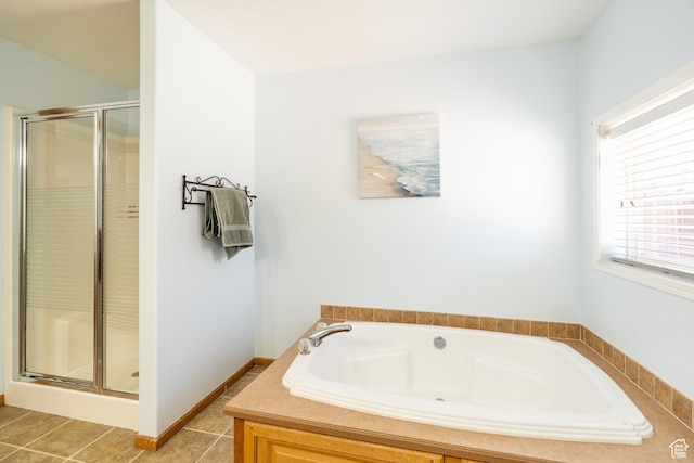 975 S 400 E, Moab, UT 84532 - full bath with a stall shower, a bath, and tile patterned flooring