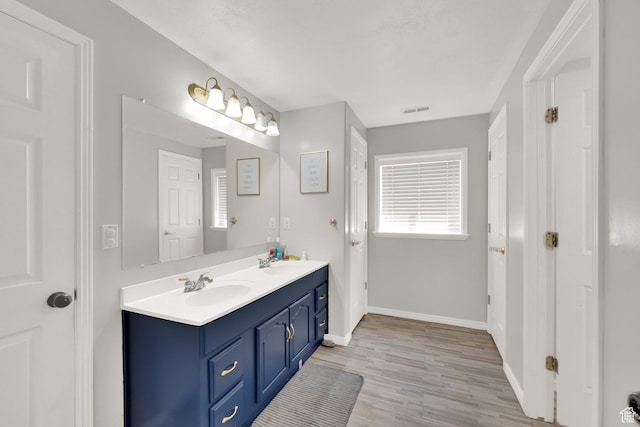 1569 Troon Cir, Syracuse, UT 84075 - full bath featuring double vanity and wood finished floors