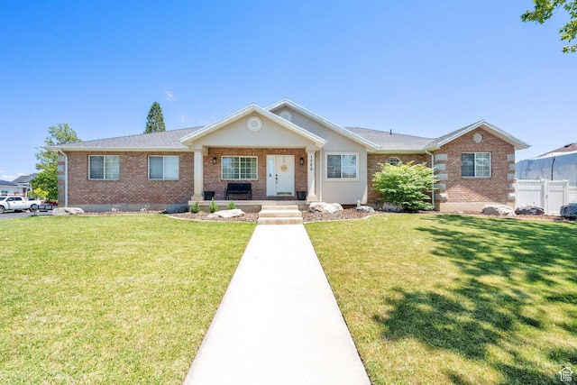 1569 Troon Cir, Syracuse, UT 84075 - view of front facade with brick siding and a porch