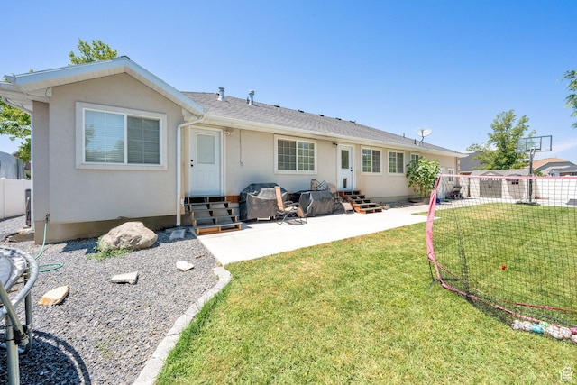 1569 Troon Cir, Syracuse, UT 84075 - rear view of house featuring entry steps, stucco siding, and a patio