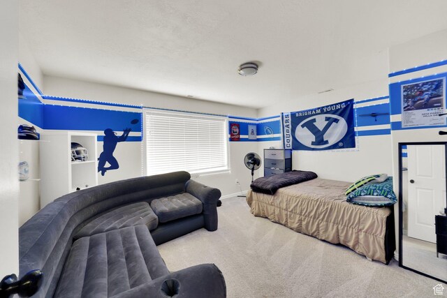 1569 Troon Cir, Syracuse, UT 84075 - bedroom featuring carpet floors and baseboards