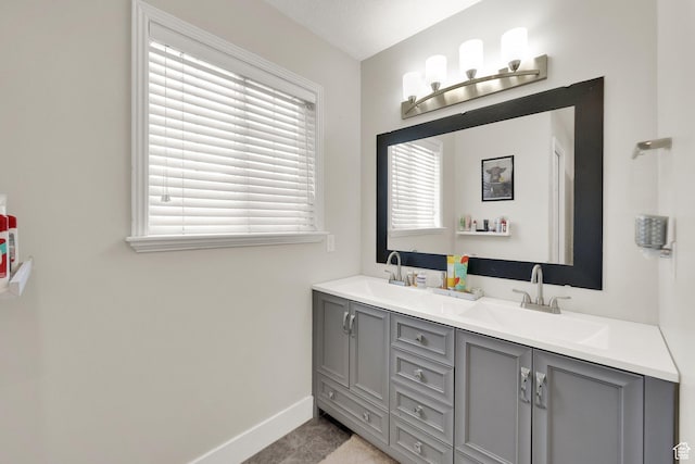 1569 Troon Cir, Syracuse, UT 84075 - full bath featuring double vanity and baseboards