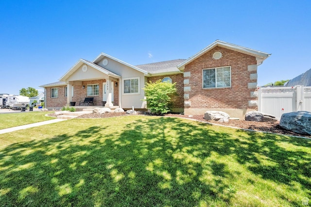 1569 Troon Cir, Syracuse, UT 84075 - ranch-style house with brick siding and a porch