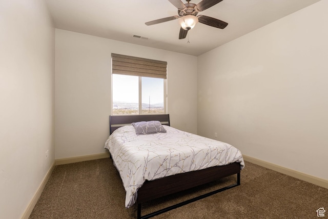 4352 W 2440 S, Hurricane, UT 84737 - carpeted bedroom with baseboards and a ceiling fan