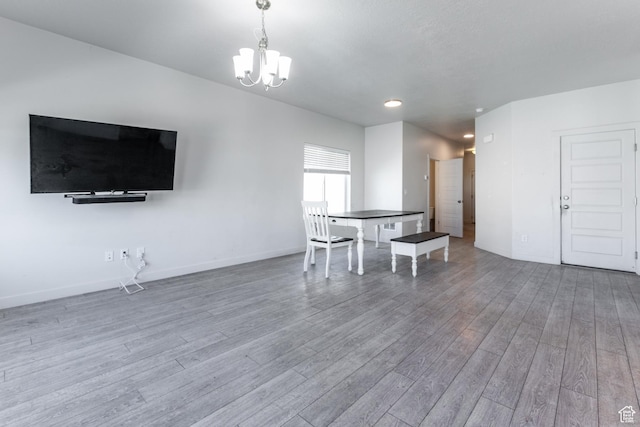 538 S Musk Ave W, Grantsville, UT 84029 - dining area with wood finished floors, a chandelier, and recessed lighting