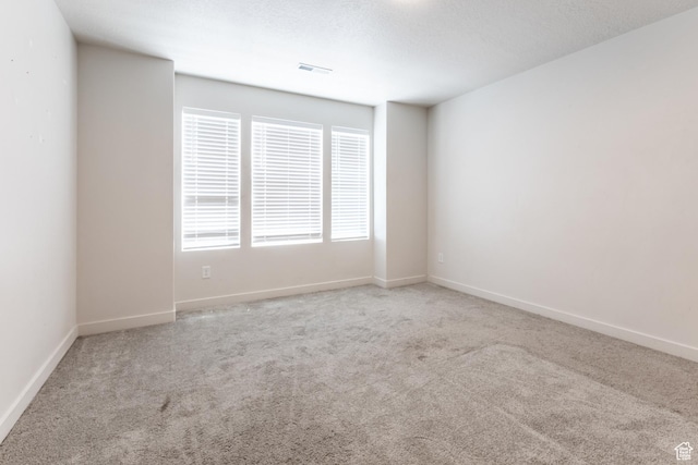 538 S Musk Ave W, Grantsville, UT 84029 - carpeted spare room featuring baseboards