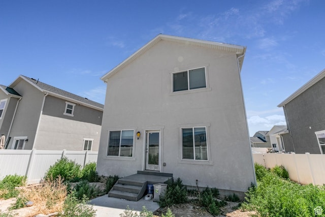 538 S Musk Ave W, Grantsville, UT 84029 - back of house featuring stucco siding