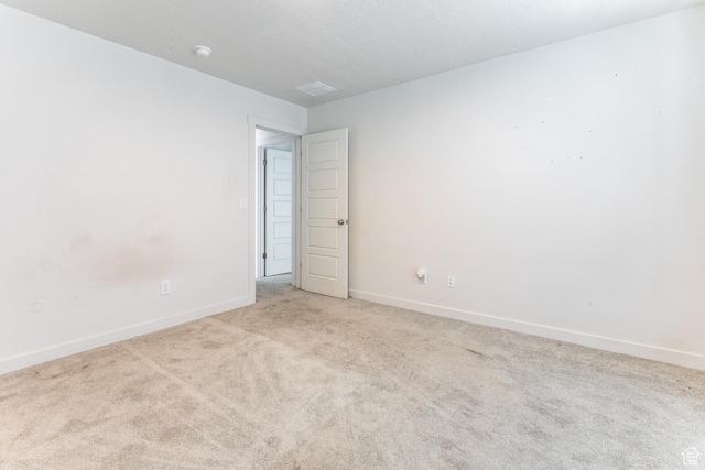 538 S Musk Ave W, Grantsville, UT 84029 - unfurnished room with light carpet and a smoke detector