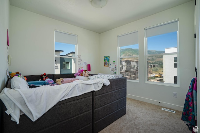 604 N Sego Way Unit 207, Farmington, UT 84025 - living room featuring carpet floors and baseboards