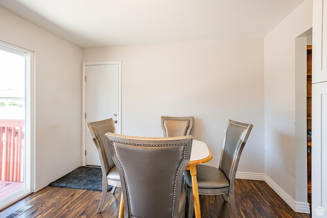 991 E Sunburn Ln, Sandy, UT 84094 - dining room with dark wood-type flooring and baseboards
