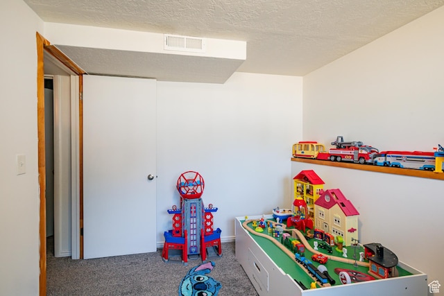 991 E Sunburn Ln, Sandy, UT 84094 - rec room featuring carpet flooring and a textured ceiling
