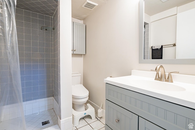 991 E Sunburn Ln, Sandy, UT 84094 - bathroom featuring vanity, a shower stall, and tile patterned flooring