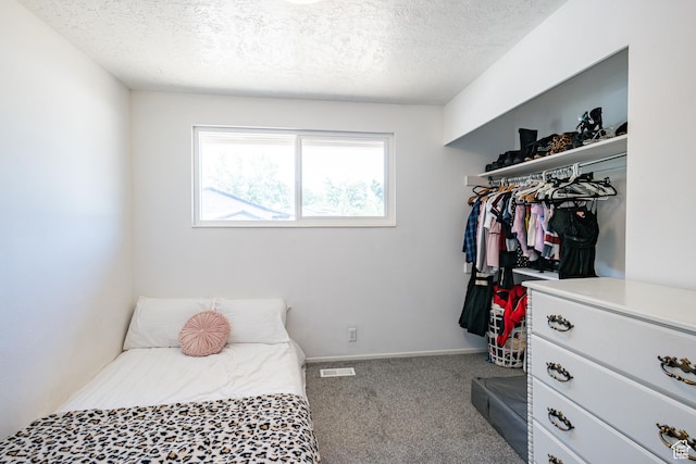 991 E Sunburn Ln, Sandy, UT 84094 - bedroom with a textured ceiling and carpet flooring
