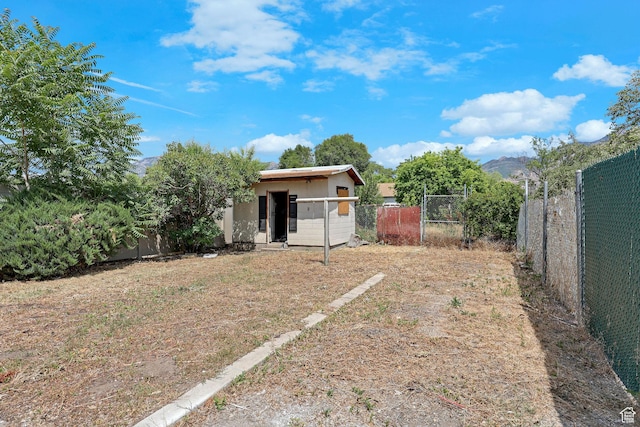 2136 Union Ave, Ogden, UT 84401 - fenced backyard with an outbuilding