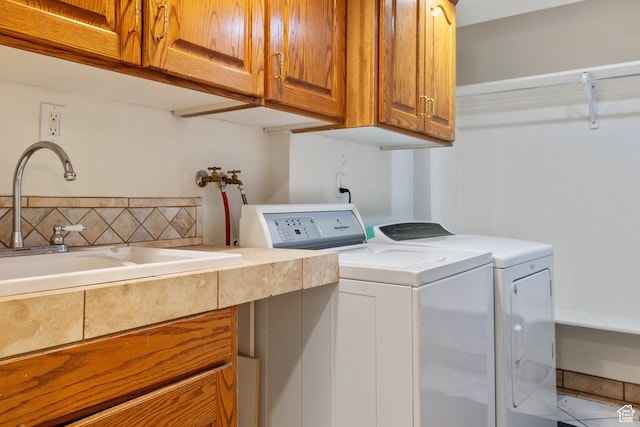 610 S Maple Dr, Woodland Hills, UT 84653 - laundry area with cabinet space and washer and clothes dryer