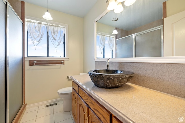 610 S Maple Dr, Woodland Hills, UT 84653 - full bathroom featuring tile patterned flooring, a shower stall, and vanity
