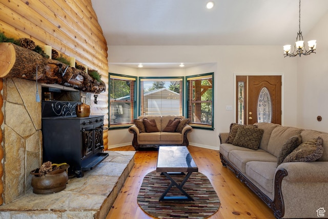 610 S Maple Dr, Woodland Hills, UT 84653 - living area featuring light wood-type flooring, a wood stove, a chandelier, and recessed lighting