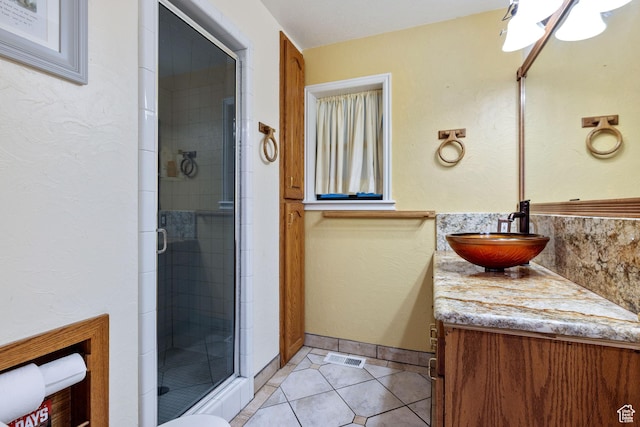 610 S Maple Dr, Woodland Hills, UT 84653 - full bath featuring a shower stall, vanity, and tile patterned floors