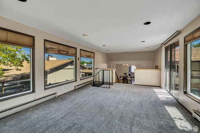 6292 S Mount Vista Dr, Taylorsville, UT 84129 - carpeted empty room featuring a baseboard radiator and recessed lighting