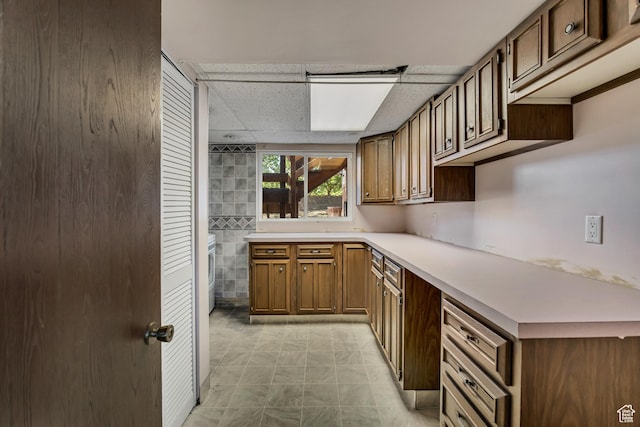 6292 S Mount Vista Dr, Taylorsville, UT 84129 - kitchen featuring light countertops and a drop ceiling