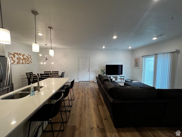 2342 E 830 S Unit 26, Spanish Fork, UT 84660 - living room featuring dark wood-style floors and recessed lighting