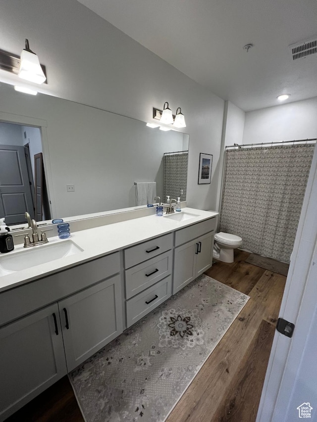 2342 E 830 S Unit 26, Spanish Fork, UT 84660 - full bath with wood finished floors, double vanity, and curtained shower