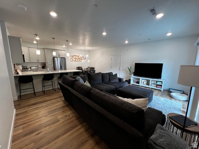 2342 E 830 S Unit 26, Spanish Fork, UT 84660 - living room featuring wood finished floors and recessed lighting