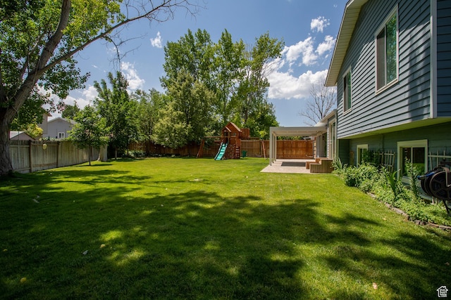 5183 W Cadenza Dr, West Jordan, UT 84081 - fenced backyard featuring a playground