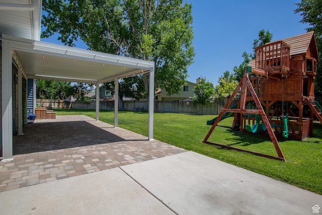 5183 W Cadenza Dr, West Jordan, UT 84081 - fenced backyard with a playground and a patio area