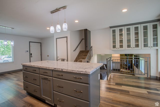 5183 W Cadenza Dr, West Jordan, UT 84081 - kitchen featuring gray cabinetry, dark wood-type flooring, recessed lighting, light countertops, and decorative light fixtures