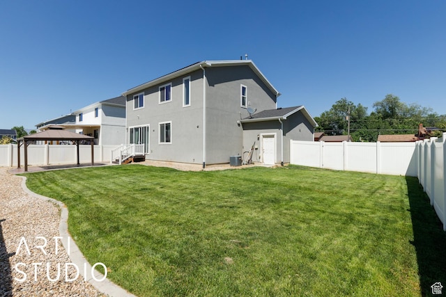 5241 S 1250 W, Riverdale, UT 84405 - back of property with a gazebo, a fenced backyard, and stucco siding
