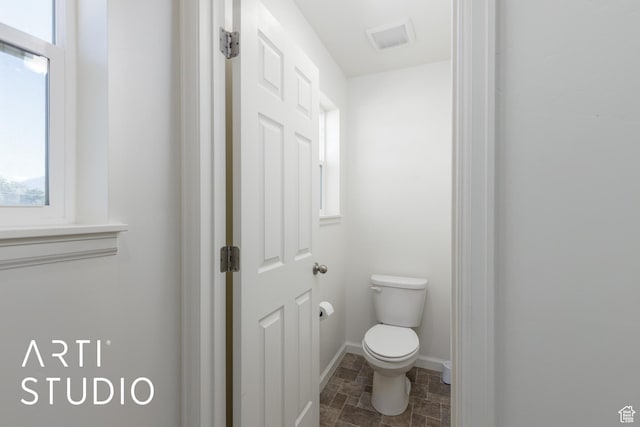 5241 S 1250 W, Riverdale, UT 84405 - bathroom with toilet and stone finish floors