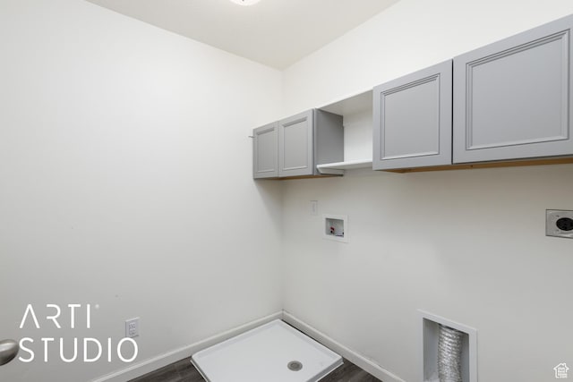 5241 S 1250 W, Riverdale, UT 84405 - laundry room with hookup for an electric dryer, hookup for a washing machine, cabinet space, and dark wood-type flooring