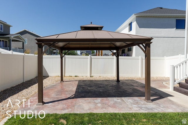 5241 S 1250 W, Riverdale, UT 84405 - fenced backyard featuring a gazebo and a patio