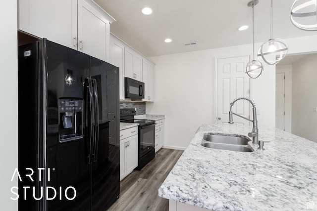 5241 S 1250 W, Riverdale, UT 84405 - kitchen with black appliances, wood finished floors, white cabinetry, decorative backsplash, and recessed lighting
