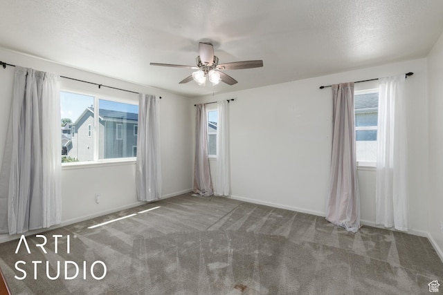 5241 S 1250 W, Riverdale, UT 84405 - carpeted spare room featuring a ceiling fan and baseboards